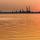 Veduta del Polo Petrolchimico di Marghera dal mare al tramonto
